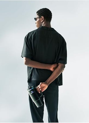 Stanley Quencher H2.0 Tumbler with Handle and Straw 30 oz | Flowstate 3-Position Lid | Cup Holder Compatible for Travel | Insulated Stainless Steel Cup | BPA-Free | Black Chroma