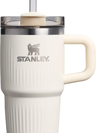 STANLEY Quencher H2.0 Tumbler with Handle and Straw 20 oz | Flowstate 3-Position Lid | Cup Holder Compatible for Travel | Insulated Stainless Steel Cup | BPA-Free | Fluted Cream Gloss