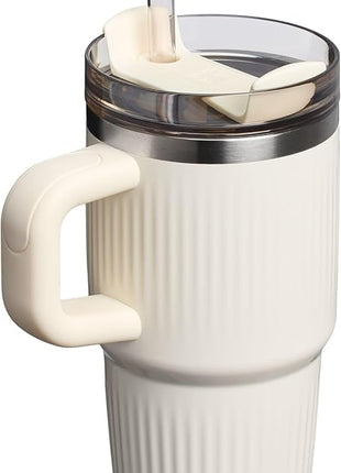STANLEY Quencher H2.0 Tumbler with Handle and Straw 20 oz | Flowstate 3-Position Lid | Cup Holder Compatible for Travel | Insulated Stainless Steel Cup | BPA-Free | Fluted Cream Gloss