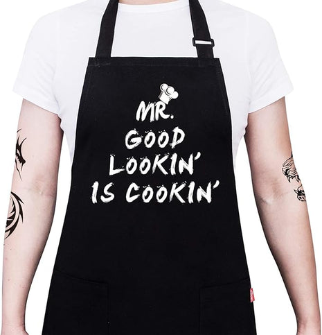 Kitchen Chef Apron - MR. GOOD LOOKIN' IS COOKIN' Funny Aprons for Men Dad - Adjustable Bib Apron with 2 Pockets and 40" Long Ties, Perfect for Cooking, Grilling, BBQ, Baking - Black