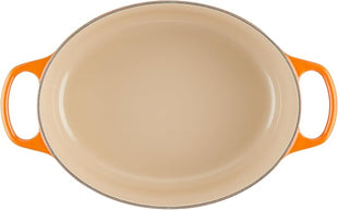 Le Creuset Enameled Cast Iron Signature Oval Dutch Oven, 5 qt, Flame