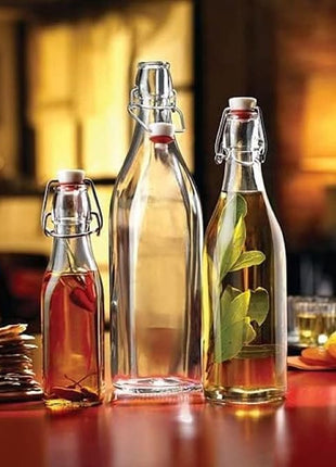 Bormioli Rocco Swing Top Glass Bottle (Set of 4) - 8.5 oz Reusable Container with Secure Metal Clasp, Ideal for Homemade Juices, Oil Infusions, Condiments, Mixers - Everyday Drinking Glasses