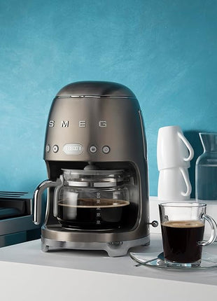 Smeg 50's Retro Style Aesthetic Drip Coffee Machine with 10 Cup Glass Carafe, Auto Start Feature, Keep Warm Plate, and Two Coffee Strength Settings (Brushed Stainless Steel)