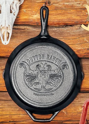 Lodge Pre-Seasoned Yellowstone Stamped Cast Iron Cookware - Signature Teardrop Handle - Use in the Oven, on the Stove, on the Grill, or Over a Campfire - 12 Inch Logo Skillet