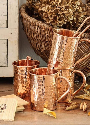 Gift Set Pure Copper Hammered Mugs with Copper Straws & Wooden Coasters Set of 4 - PREMIUM QUALITY -16 Oz Copper Mug - 100% Handcrafted - A Gift Pack for your loved Ones.