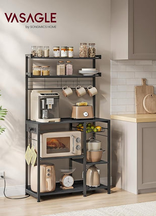 VASAGLE Bakers Rack with Power Outlet, 35.4 Inches Microwave Stand, Coffee Bar, 4 AC Outlets, with Adjustable Shelves, 8 S-Hooks, Basket, Spice Racks, Charcoal Gray and Ink Black UKKS031B22