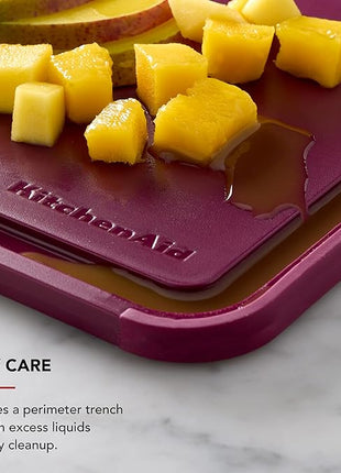 KitchenAid Classic Plastic Cutting Board with Perimeter Trench and Non Slip Edges, Dishwasher Safe, 8 x 10 inch, Beetroot