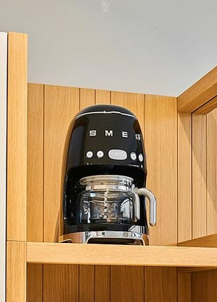 Smeg 50's Retro Style Aesthetic Drip Coffee Machine with 10 Cup Glass Carafe, Auto Start Feature, Keep Warm Plate, and Two Coffee Strength Settings (Black)