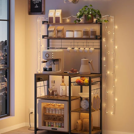 VASAGLE Bakers Rack with Power Outlet, 35.4 Inches Microwave Stand, Coffee Bar, 4 AC Outlets, with Adjustable Shelves, 8 S-Hooks, Basket, Spice Racks, Rustic Brown and Ink Black UKKS031K01