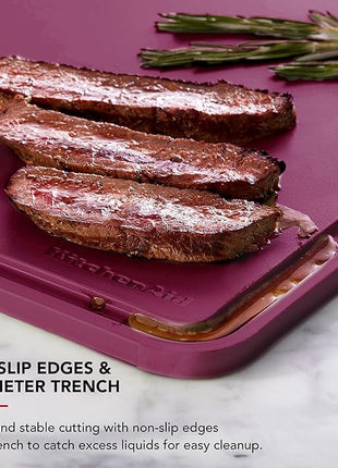 KitchenAid Classic Plastic Cutting Board with Perimeter Trench and Non Slip Edges, Dishwasher Safe, 12 x 18 inch, Beetroot