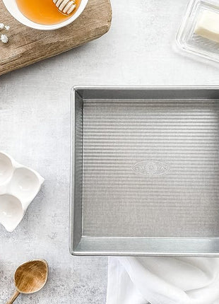 USA Pan Bakeware Aluminzed Steel 5-Piece Set Half, Cookie Sheet, Loaf, Square, Round Cake Pan