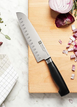 ZWILLING Four Star 7-inch Hollow Edge Santoku Knife