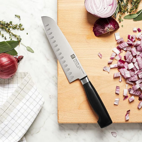 ZWILLING Four Star 7-inch Hollow Edge Santoku Knife